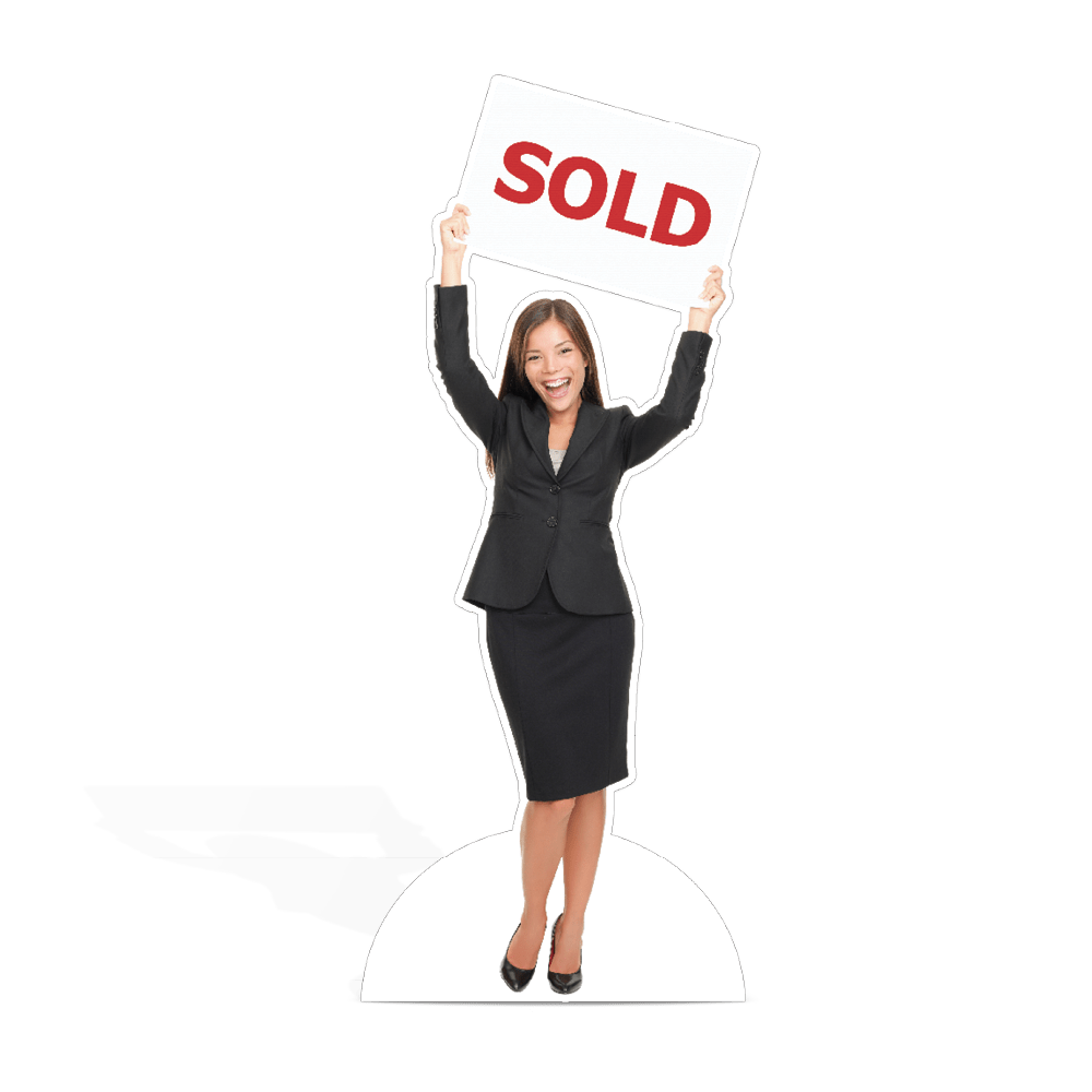 Life Size Cut Out of a woman holding a sold sign